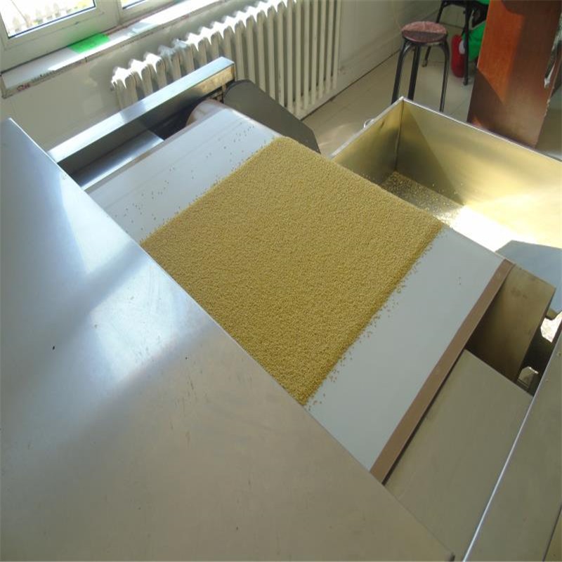 Microwave curing and baking machine for grains